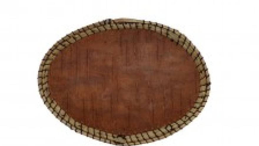 Oval wicker basket with brown base and striped woven rim.