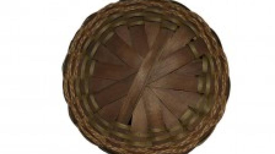 Woven brown basket viewed from above, circular pattern.