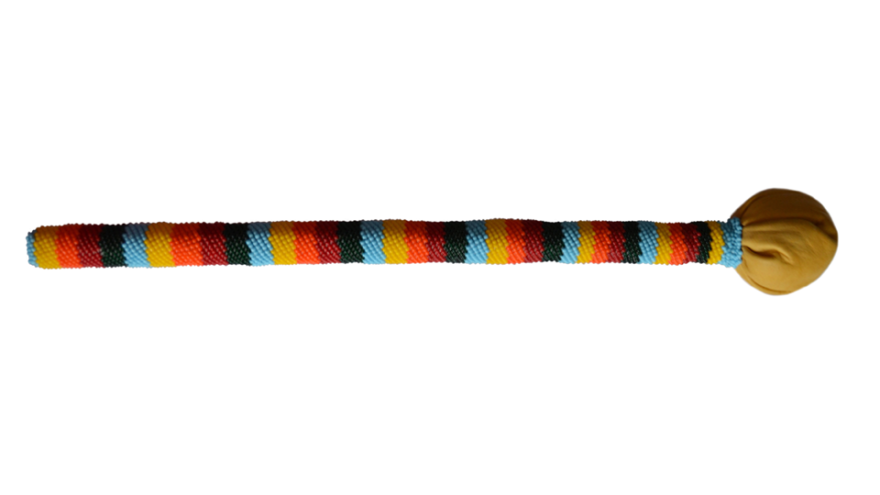 Colorful striped stick with a brown round end.