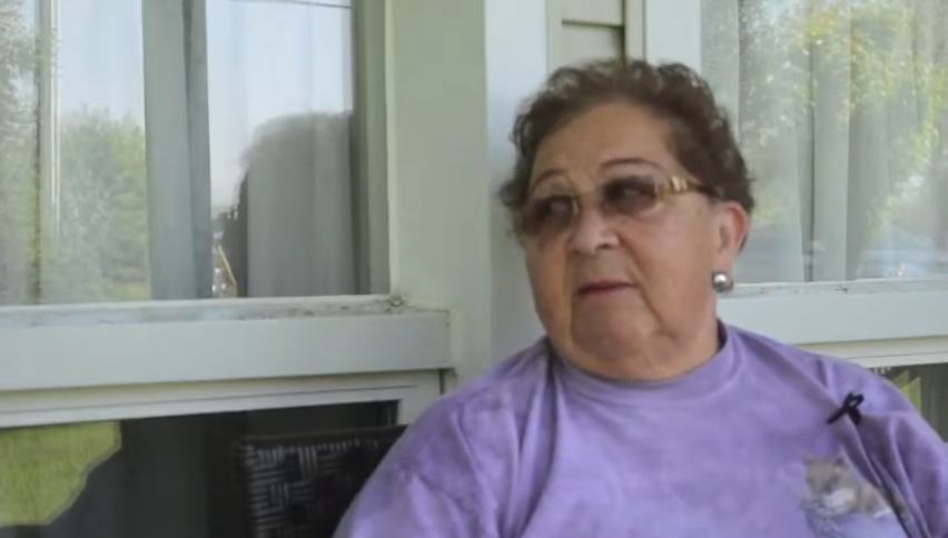 Woman sitting on a porch